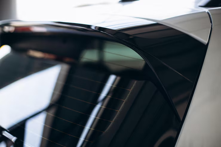 spoiler-car-roof-close-up-photo_1303-31688